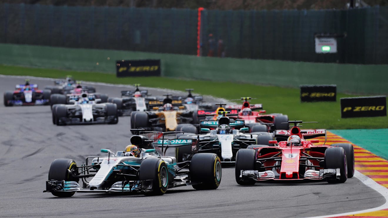 Lewis Hamilton (GBR) Mercedes-Benz F1 W08 Hybrid and Sebastian Vettel (GER) Ferrari SF70-H at the re-start at Formula One World Championship, Rd12, Belgian Grand Prix, Race, Spa Francorchamps, Belgium, Sunday 27 August 2017. © Sutton Images