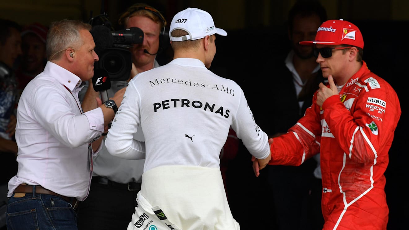 Pole sitter Valtteri Bottas (FIN) Mercedes AMG F1 celebrates with Kimi Raikkonen (FIN) Ferrari in parc ferme as Johnny Herbert (GBR) Sky TV looks on at Formula One World Championship, Rd19, Brazilian Grand Prix, Qualifying, Interlagos, Sao Paulo, Brazil, Saturday 11 November 2017. © Mark Sutton/Sutton Images