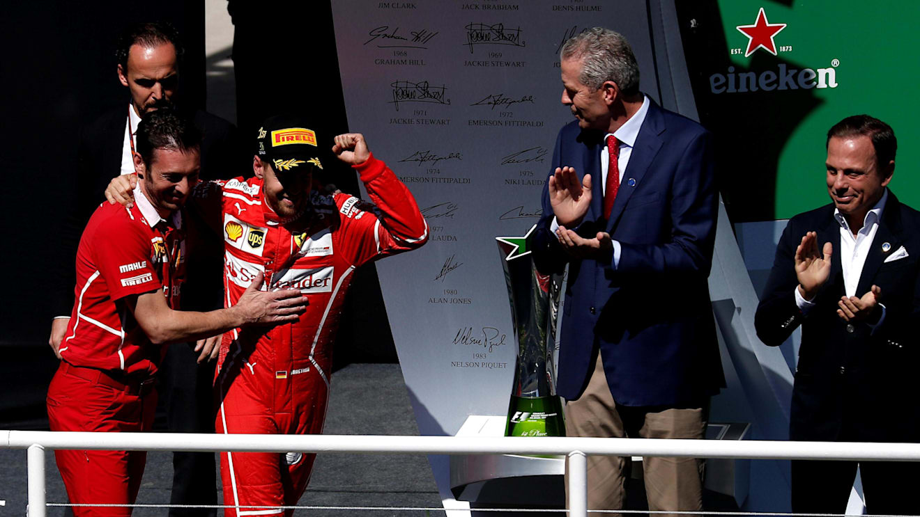 Race winner Sebastian Vettel (GER) Ferrari celebrates on the podium with G. Vietina (ITA) Ferrari at Formula One World Championship, Rd19, Brazilian Grand Prix, Race, Interlagos, Sao Paulo, Brazil, Sunday 12 November 2017. © Manuel Goria/Sutton Images