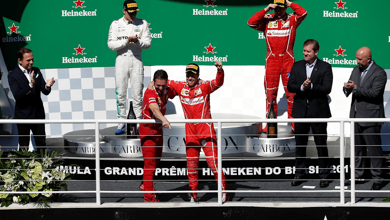 Race winner Sebastian Vettel (GER) Ferrari celebrates on the podium with G. Vietina (ITA) Ferrari at Formula One World Championship, Rd19, Brazilian Grand Prix, Race, Interlagos, Sao Paulo, Brazil, Sunday 12 November 2017. © Manuel Goria/Sutton Images
