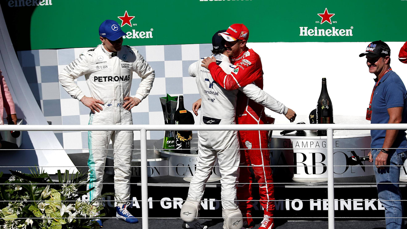 Valtteri Bottas (FIN) Mercedes AMG F1, race winner Sebastian Vettel (GER) Ferrari and Rubens Barrichello (BRA) celebrate on the podium with Felipe Massa (BRA) Williams at Formula One World Championship, Rd19, Brazilian Grand Prix, Race, Interlagos, Sao Paulo, Brazil, Sunday 12 November 2017. © Manuel Goria/Sutton Images