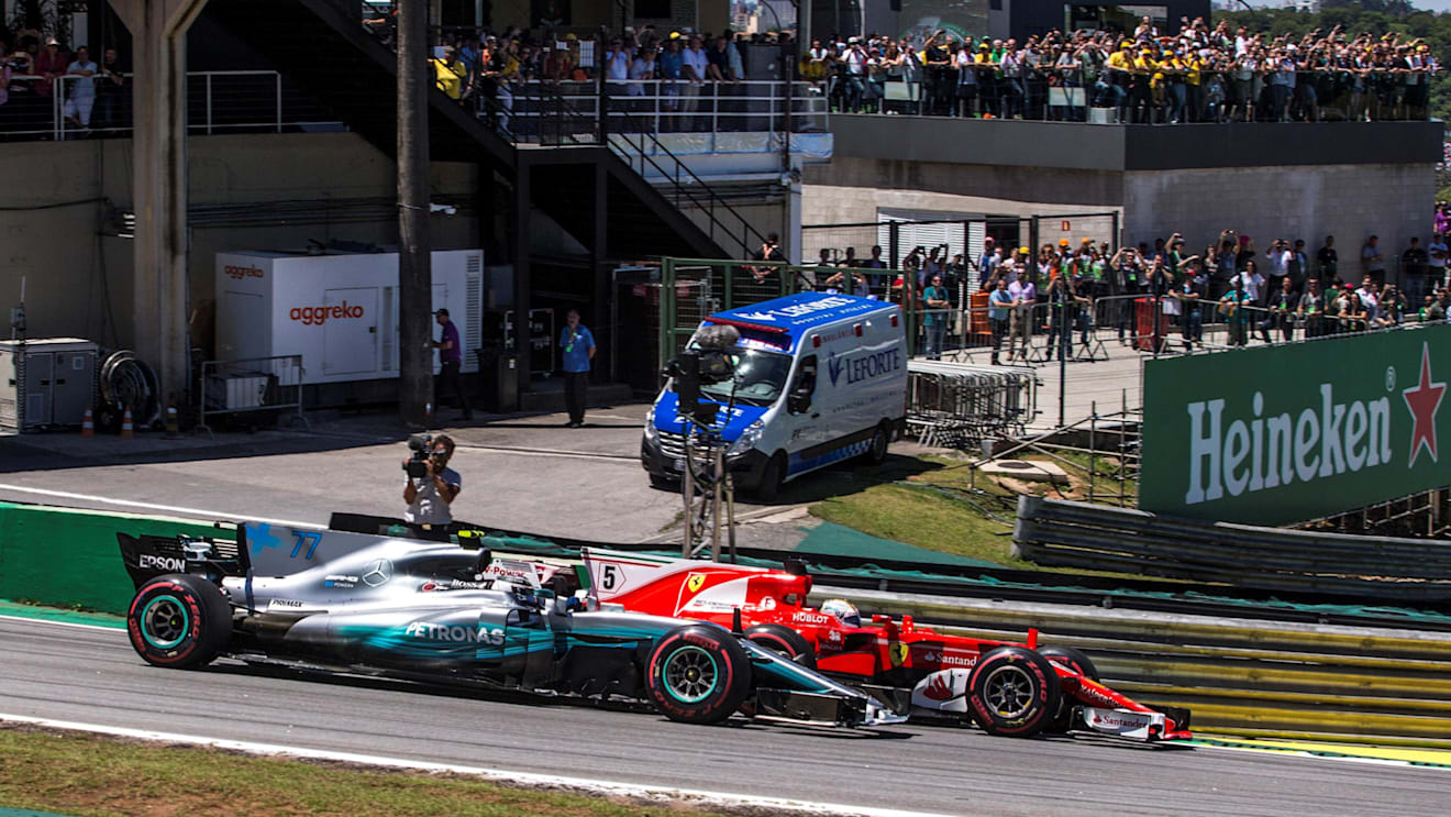 Sebastian Vettel (GER) Ferrari SF70-H and Valtteri Bottas (FIN) Mercedes-Benz F1 W08 Hybrid battle for the lead at the start of the race at Formula One World Championship, Rd19, Brazilian Grand Prix, Race, Interlagos, Sao Paulo, Brazil, Sunday 12 November