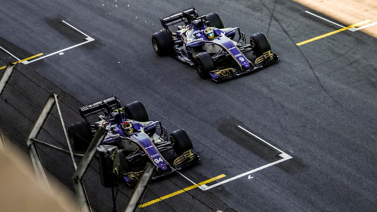 Ericsson (SWE) Sauber C36 and  Wehrlein (GER) Sauber C36 cross the line to finish the race at Formula One World Championship, Rd19, Brazilian Grand Prix, Race, Interlagos, Sao Paulo, Brazil, Sunday 12 November 2017. © Manuel Goria/Sutton Images