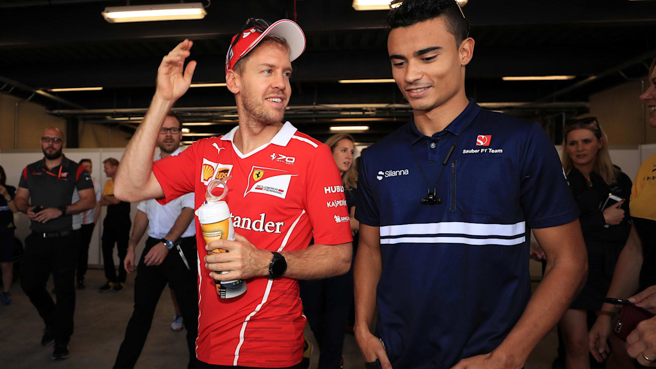 Sebastian Vettel (GER) Ferrari and Pascal Wehrlein (GER) Sauber on the drivers parade at Formula One World Championship, Rd19, Brazilian Grand Prix, Race, Interlagos, Sao Paulo, Brazil, Sunday 12 November 2017. © Kym Illman/Sutton Images