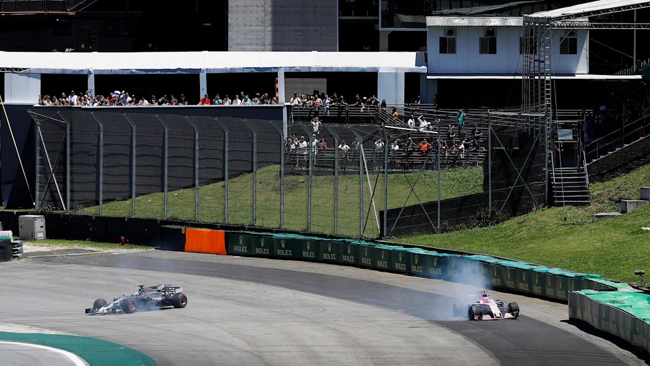 Romain Grosjean (FRA) Haas VF-17 and Esteban Ocon (FRA) Force India VJM10 collide on lap one at Formula One World Championship, Rd19, Brazilian Grand Prix, Race, Interlagos, Sao Paulo, Brazil, Sunday 12 November 2017. © Glenn Dunbar/LAT/Sutton Images