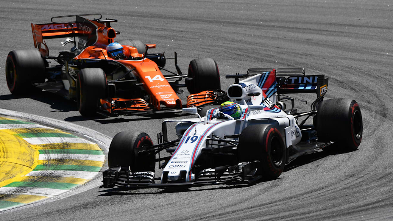Felipe Massa (BRA) Williams FW40 and Fernando Alonso (ESP) McLaren MCL32 at Formula One World Championship, Rd19, Brazilian Grand Prix, Race, Interlagos, Sao Paulo, Brazil, Sunday 12 November 2017. © Mark Sutton/Sutton Images