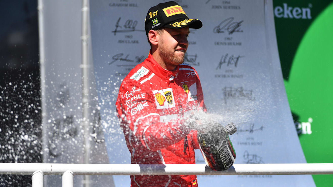 Race winner Sebastian Vettel (GER) Ferrari celebrates on the podium with the champagne at Formula One World Championship, Rd19, Brazilian Grand Prix, Race, Interlagos, Sao Paulo, Brazil, Sunday 12 November 2017. © Mark Sutton/Sutton Images