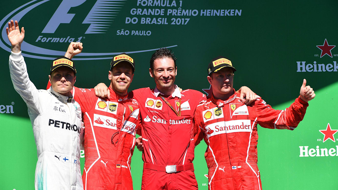 Podium (L to R): Valtteri Bottas (FIN) Mercedes AMG F1, Sebastian Vettel (GER) Ferrari, G Vietina (ITA) Ferrari and Kimi Raikkonen (FIN) Ferrari celebrate on the podium at Formula One World Championship, Rd19, Brazilian Grand Prix, Race, Interlagos, Sao P
