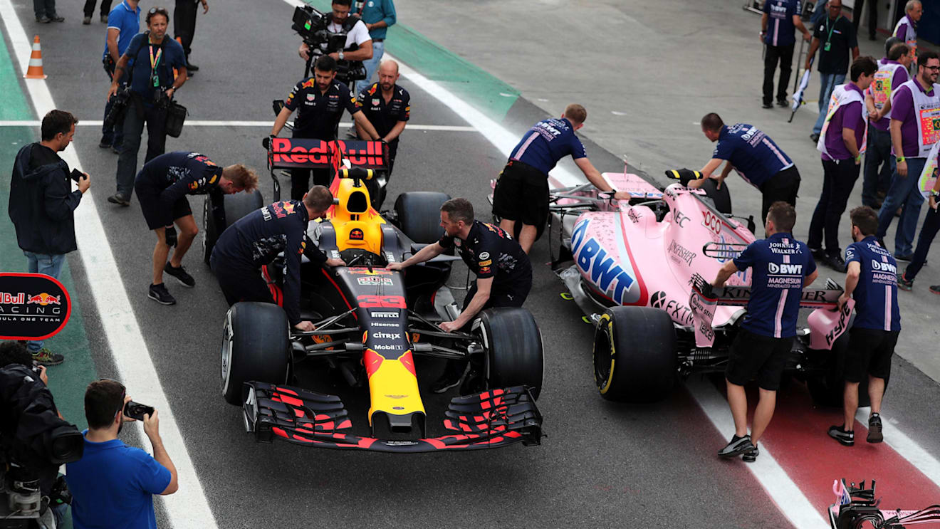 The car of Max Verstappen (NED) Red Bull Racing RB13 and Esteban Ocon (FRA) Force India VJM10 are pushed by mechanics at Formula One World Championship, Rd19, Brazilian Grand Prix, Preparations, Interlagos, Sao Paulo, Brazil, Thursday 9 November 2017. © Kym Illman/Sutton Images