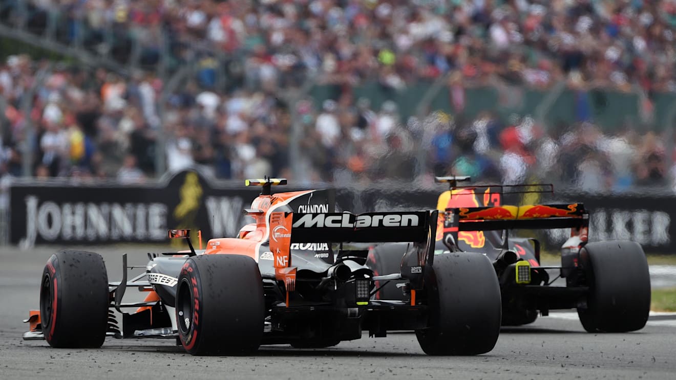 Stoffel Vandoorne (BEL) McLaren MCL32 and Daniel Ricciardo (AUS) Red Bull Racing RB13 battle at Formula One World Championship, Rd10, British Grand Prix, Race, Silverstone, England, Sunday 16 July 2017. © Sutton Images