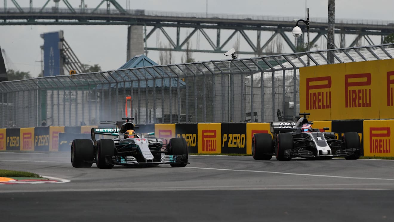 Lewis Hamilton (GBR) Mercedes-Benz F1 W08 Hybrid and Romain Grosjean (FRA) Haas VF-17 at Formula One World Championship, Rd7, Canadian Grand Prix, Practice, Montreal, Canada, Friday 9 June 2017. © Sutton Motorsport Images