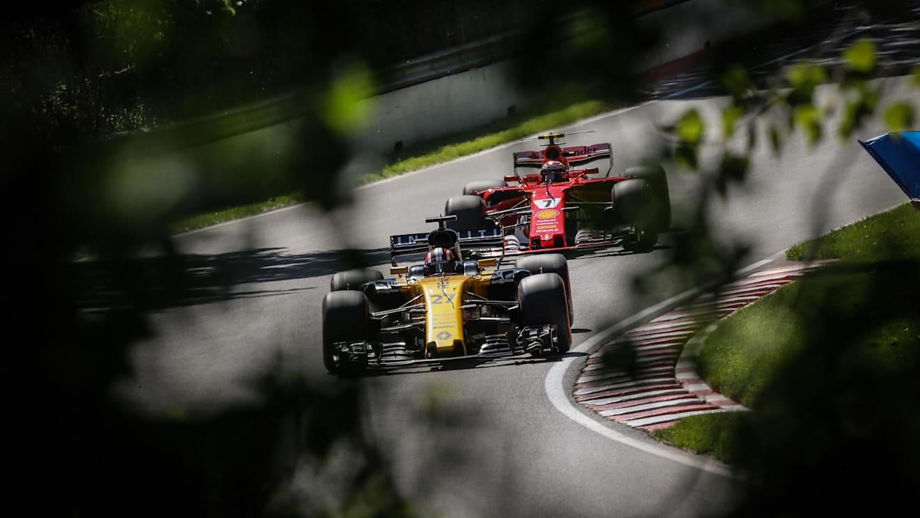 Nico Hulkenberg (GER) Renault Sport F1 Team RS17 and Kimi Raikkonen (FIN) Ferrari SF70-H at Formula One World Championship, Rd7, Canadian Grand Prix, Qualifying, Montreal, Canada, Saturday 10 June 2017. © Sutton Motorsport Images