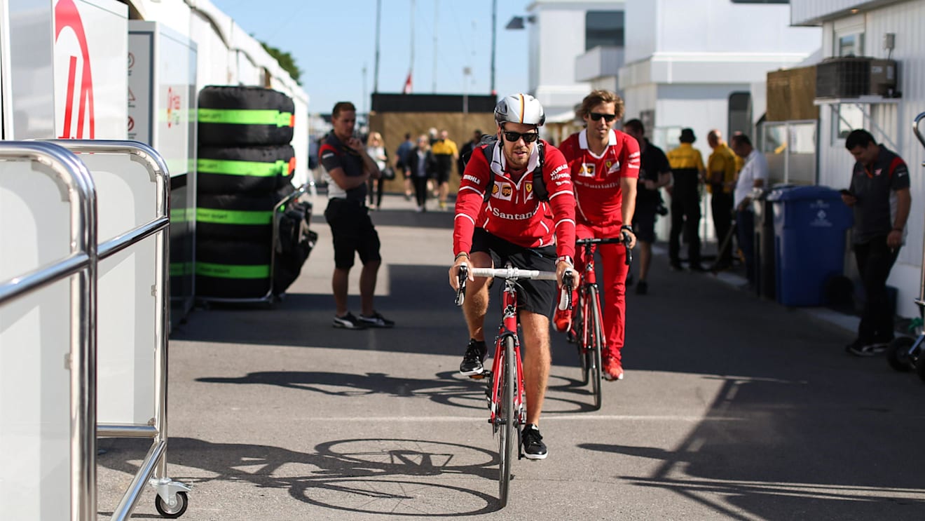 Sebastian Vettel (GER) Ferrari on a bike at Formula One World Championship, Rd7, Canadian Grand Prix, Qualifying, Montreal, Canada, Saturday 10 June 2017. © Sutton Motorsport Images