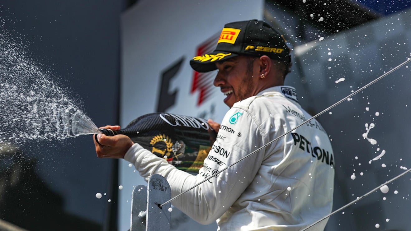 Race winner Lewis Hamilton (GBR) Mercedes AMG F1 celebrates on the podium with the champagne at Formula One World Championship, Rd7, Canadian Grand Prix, Race, Montreal, Canada, Sunday 11 June 2017. © Sutton Motorsport Images