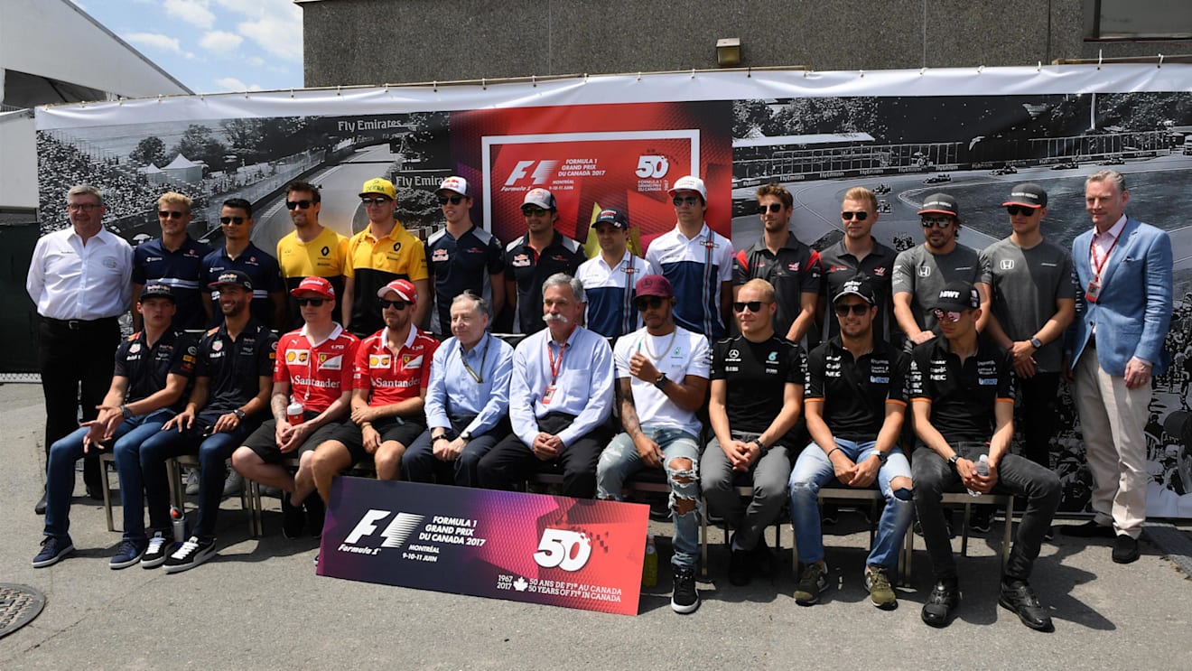 F1 driver group photo with Ross Brawn (GBR) Formula One Managing Director of Motorsports, Sean Bratches (USA) Formula One Managing Director, Commercial Operations, Jean Todt (FRA) FIA President and Chase Carey (USA) Chief Executive Officer and Executive Chairman of the Formula One Group at Formula One World Championship, Rd7, Canadian Grand Prix, Race, Montreal, Canada, Sunday 11 June 2017. © Sutton Motorsport Images