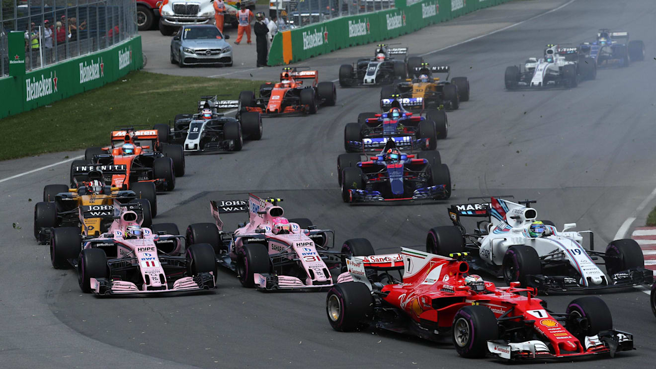 Kimi Raikkonen (FIN) Ferrari SF70-H, Sergio Perez (MEX) Force India VJM10 and Esteban Ocon (FRA) Force India VJM10 at the start of the race at Formula One World Championship, Rd7, Canadian Grand Prix, Race, Montreal, Canada, Sunday 11 June 2017. © Sutton Images