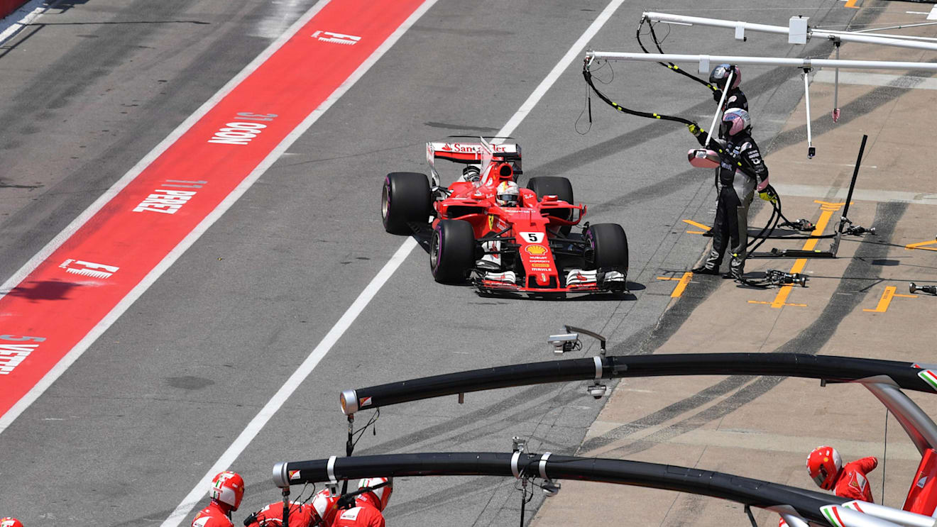 Sebastian Vettel (GER) Ferrari SF70-H pits with a broken front wing at Formula One World Championship, Rd7, Canadian Grand Prix, Race, Montreal, Canada, Sunday 11 June 2017. © Sutton Images