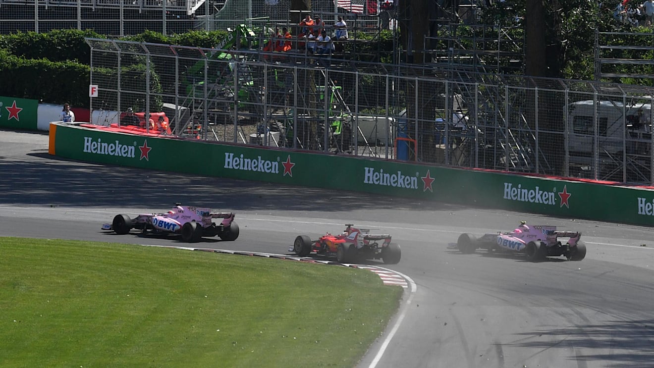 Sergio Perez (MEX) Force India VJM10, Esteban Ocon (FRA) Force India VJM10 and Sebastian Vettel (GER) Ferrari SF70-H battle at Formula One World Championship, Rd7, Canadian Grand Prix, Race, Montreal, Canada, Sunday 11 June 2017. © Sutton Motorsport Images