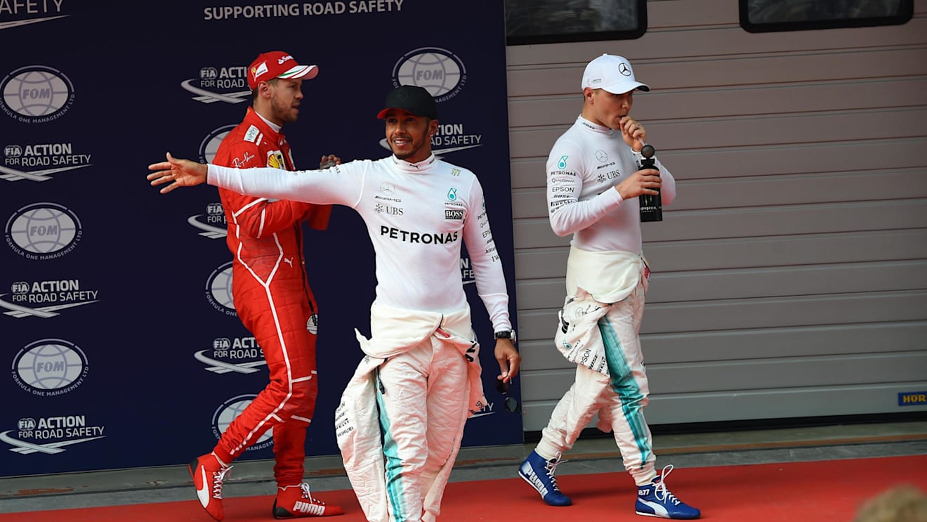 (L to R): Vettel (GER) Ferrari, Hamilton (GBR) and Bottas (FIN) Mercedes AMG F1 celebrate in parc ferme at Formula One World Championship, Rd2, Chinese Grand Prix, Qualifying, Shanghai, China, Saturday 8 April 2017. © Sutton Motorsport Images