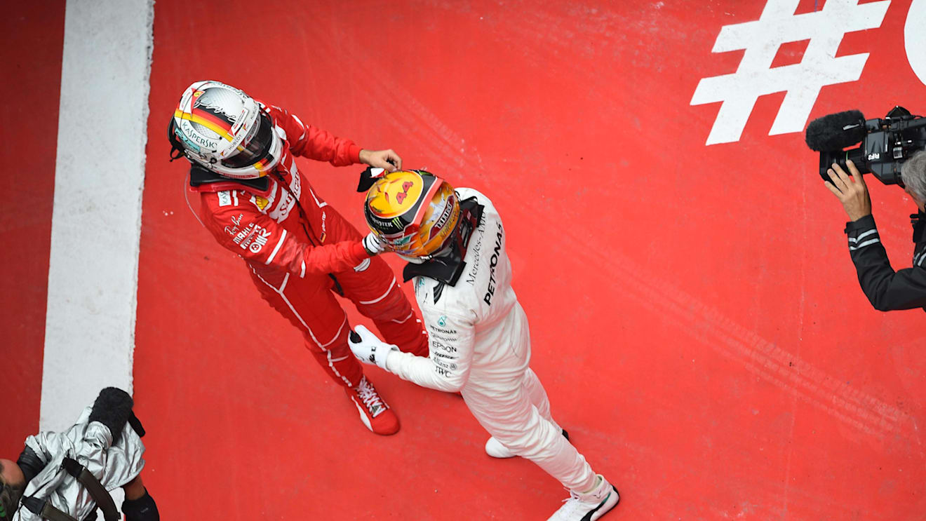 Race winner Lewis Hamilton (GBR) Mercedes AMG F1 and Sebastian Vettel (GER) Ferrari celebrate in parc ferme at Formula One World Championship, Rd2, Chinese Grand Prix, Race, Shanghai, China, Sunday 9 April 2017. © Sutton Motorsport Images