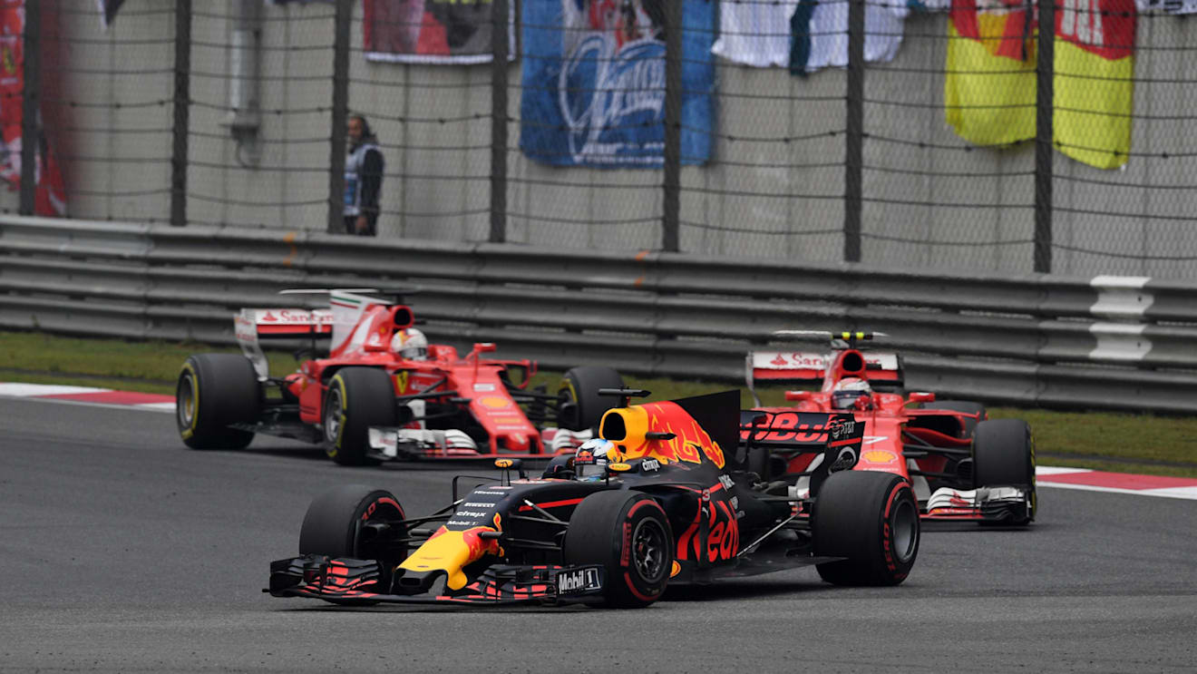 Ricciardo (AUS) Red Bull Racing RB13 leads Raikkonen (FIN) Ferrari SF70-H and Vettel (GER) Ferrari SF70-H at Formula One World Championship, Rd2, Chinese Grand Prix, Race, Shanghai, China, Sunday 9 April 2017. © Sutton Motorsport Images