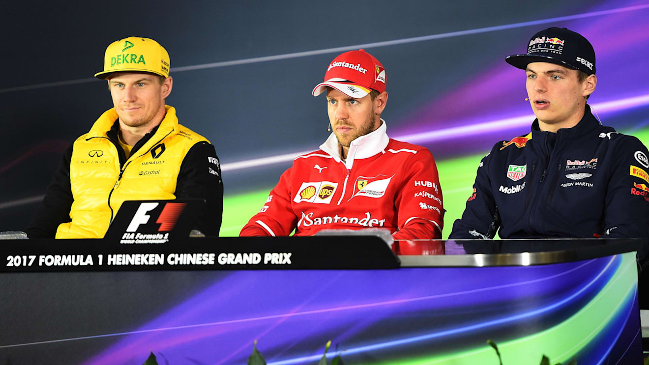 (L to R): Nico Hulkenberg (GER) Renault Sport F1 Team, Sebastian Vettel (GER) Ferrari and Max Verstappen (NED) Red Bull Racing in the Press Conference at F1 World Championship, Chinese Grand Prix, Shanghai, China, 6 April 2017. ©Sutton Motorsport Images