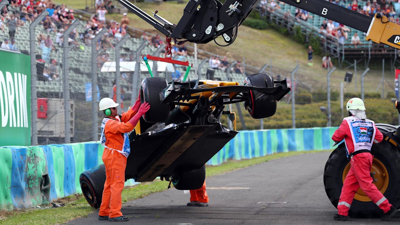 The crashed car of Jolyon Palmer (GBR) Renault Sport F1 Team RS17 is recovered by Marshals in FP2 at Formula One World Championship, Rd11, Hungarian Grand Prix, Practice, Hungaroring, Hungary, Friday 28 July 2017. © Sutton Images