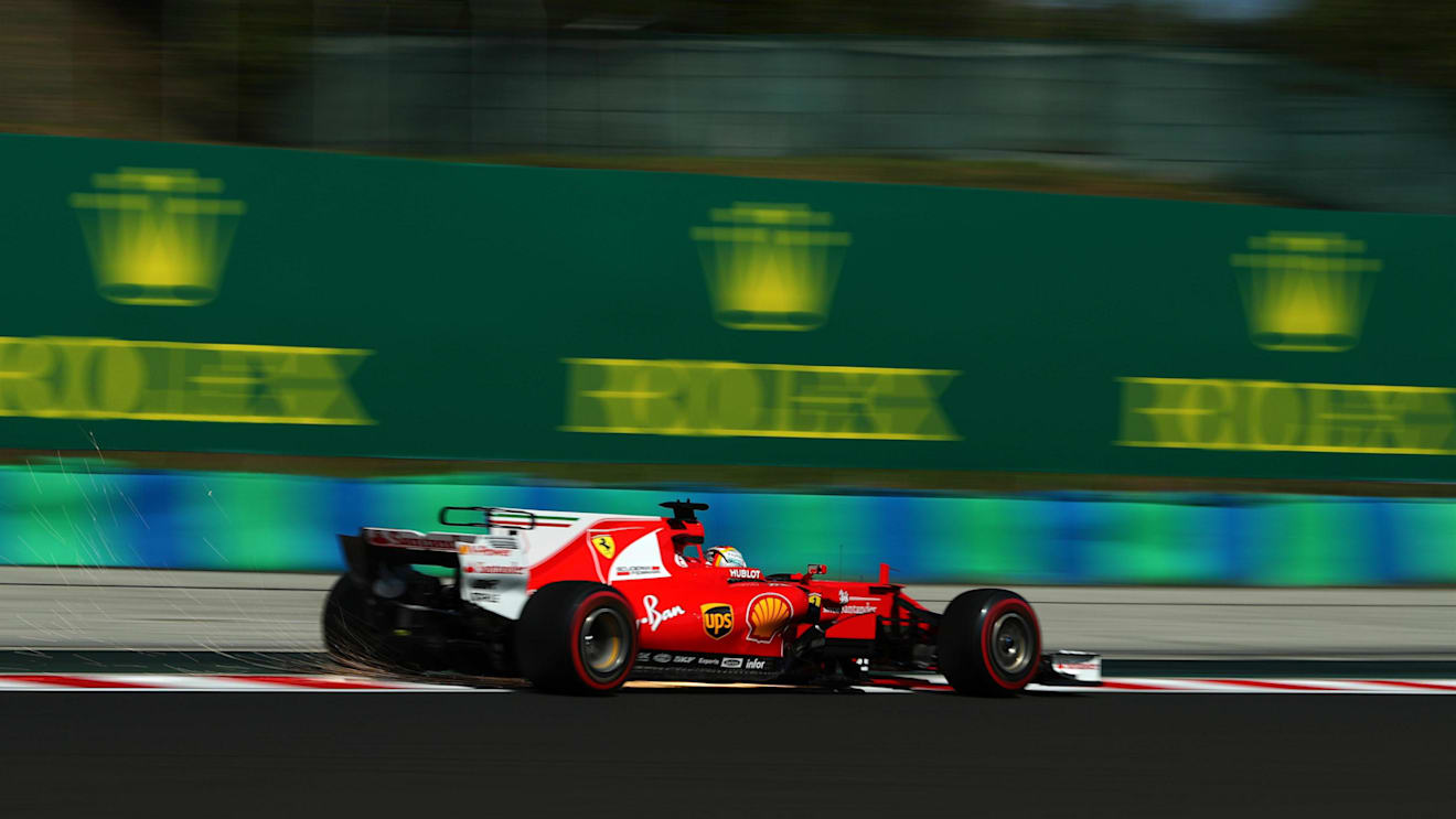 Sebastian Vettel (GER) Ferrari SF70-H sparks at Formula One World Championship, Rd11, Hungarian Grand Prix, Practice, Hungaroring, Hungary, Friday 28 July 2017. © Sutton Images