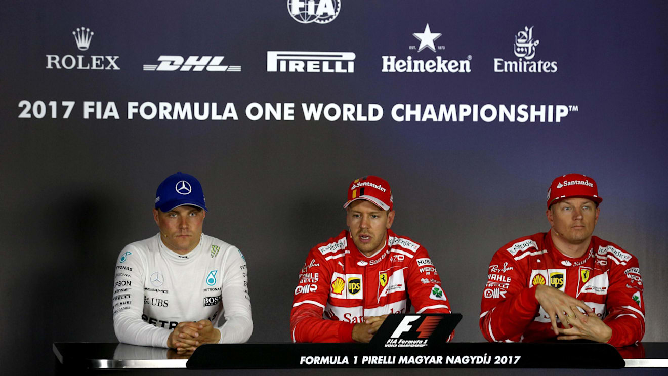 Valtteri Bottas (FIN) Mercedes AMG F1, Pole sitter Sebastian Vettel (GER) Ferrari and Kimi Raikkonen (FIN) Ferrari in the Press Conference at Formula One World Championship, Rd11, Hungarian Grand Prix, Qualifying, Hungaroring, Hungary, Saturday 29 July 2017. © Sutton Images