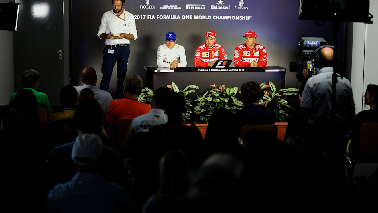 Matteo Bonciani (ITA) FIA Media Delegate, Valtteri Bottas (FIN) Mercedes AMG F1, Pole sitter Sebastian Vettel (GER) Ferrari and Kimi Raikkonen (FIN) Ferrari in the Press Conference at Formula One World Championship, Rd11, Hungarian Grand Prix, Qualifying, Hungaroring, Hungary, Saturday 29 July 2017. © Sutton Images
