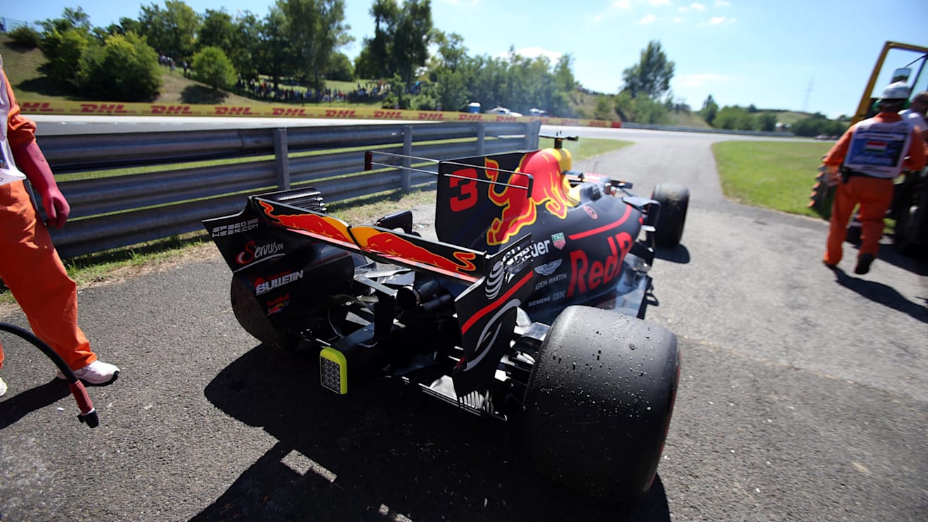 The car of Daniel Ricciardo (AUS) Red Bull Racing RB13 is recovered my Marshals after stopping on track in FP3 at Formula One World Championship, Rd11, Hungarian Grand Prix, Qualifying, Hungaroring, Hungary, Saturday 29 July 2017. © Sutton Images