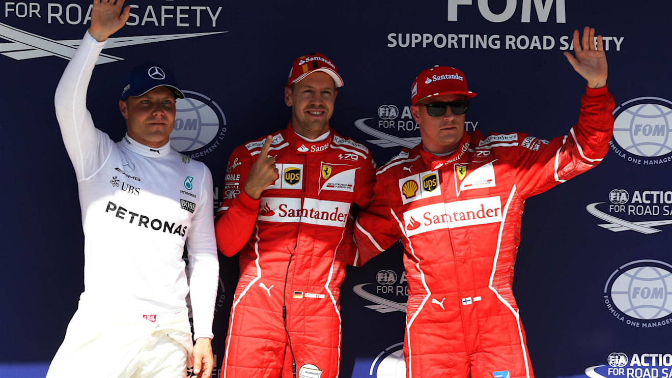 Valtteri Bottas (FIN) Mercedes AMG F1, pole sitter Sebastian Vettel (GER) Ferrari and Kimi Raikkonen (FIN) Ferrari celebrate in parc ferme at Formula One World Championship, Rd11, Hungarian Grand Prix, Qualifying, Hungaroring, Hungary, Saturday 29 July 2017. © Sutton Images