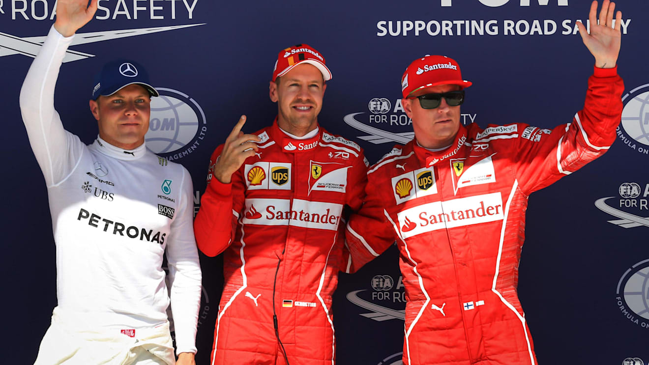 (L to R): Valtteri Bottas (FIN) Mercedes AMG F1, pole sitter Sebastian Vettel (GER) Ferrari and Kimi Raikkonen (FIN) Ferrari celebrate in parc ferme at Formula One World Championship, Rd11, Hungarian Grand Prix, Qualifying, Hungaroring, Hungary, Saturday 29 July 2017. © Sutton Images