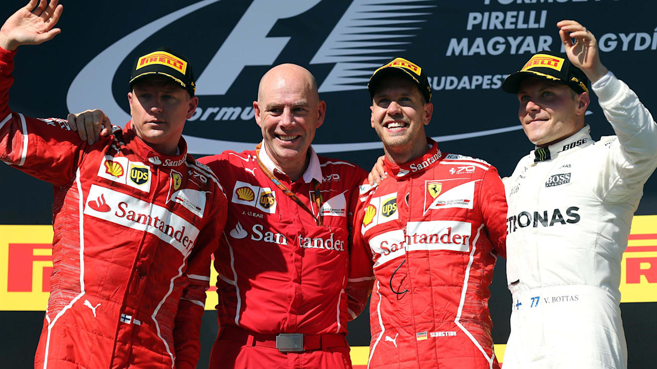 Race winner Sebastian Vettel (GER) Ferrari celebrates on the podium with Kimi Raikkonen (FIN) Ferrari, Jock Clear (GBR) Ferrari Chief Engineer and Valtteri Bottas (FIN) Mercedes AMG F1 at Formula One World Championship, Rd11, Hungarian Grand Prix, Race, Hungaroring, Hungary, Sunday 30 July 2017. © Sutton Images