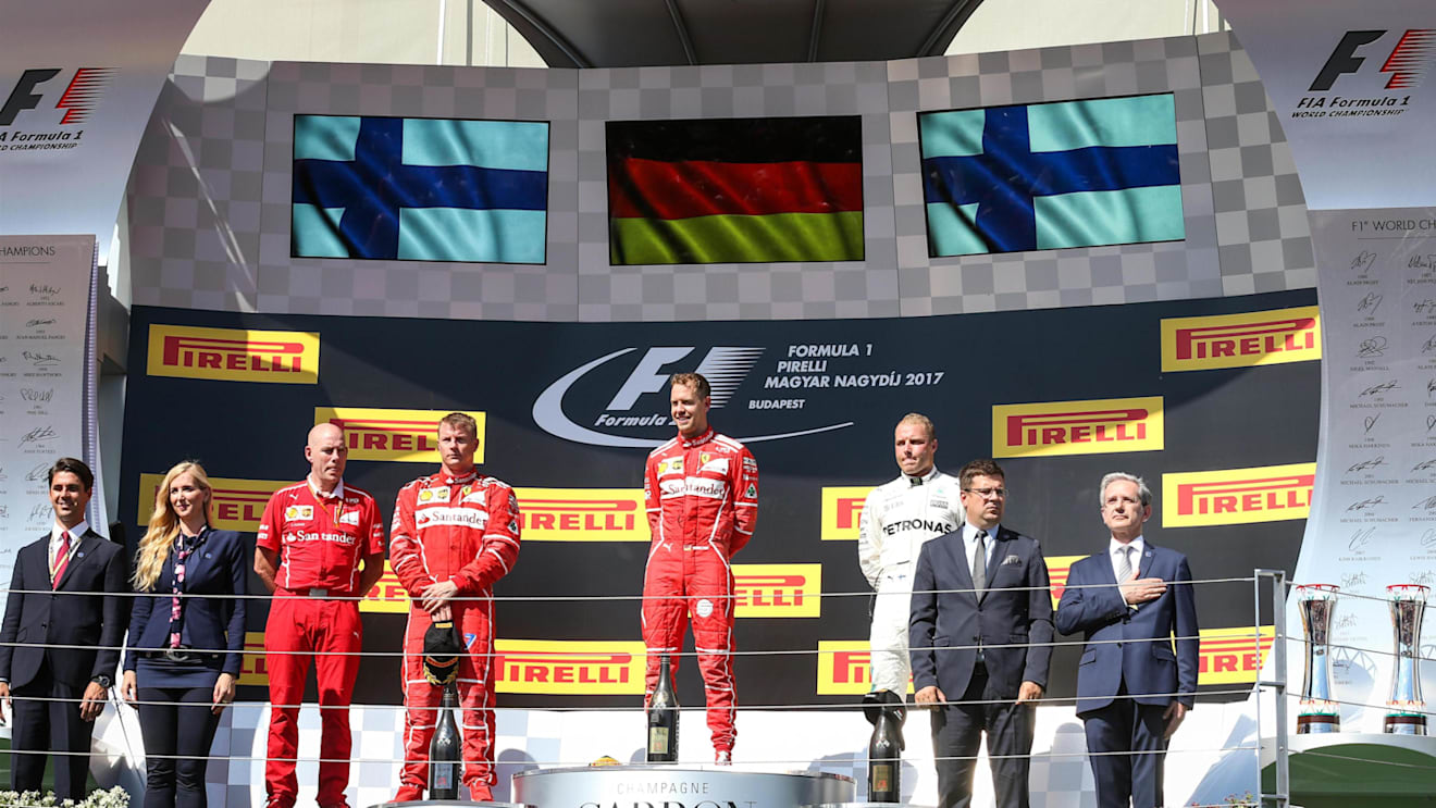 Podium: (L to R): Jock Clear (GBR) Ferrari Chief Engineer, Kimi Raikkonen (FIN) Ferrari, race winner Sebastian Vettel (GER) Ferrari and Valtteri Bottas (FIN) Mercedes AMG F1 celebrate on the podium at Formula One World Championship, Rd11, Hungarian Grand Prix, Race, Hungaroring, Hungary, Sunday 30 July 2017. © Sutton Images