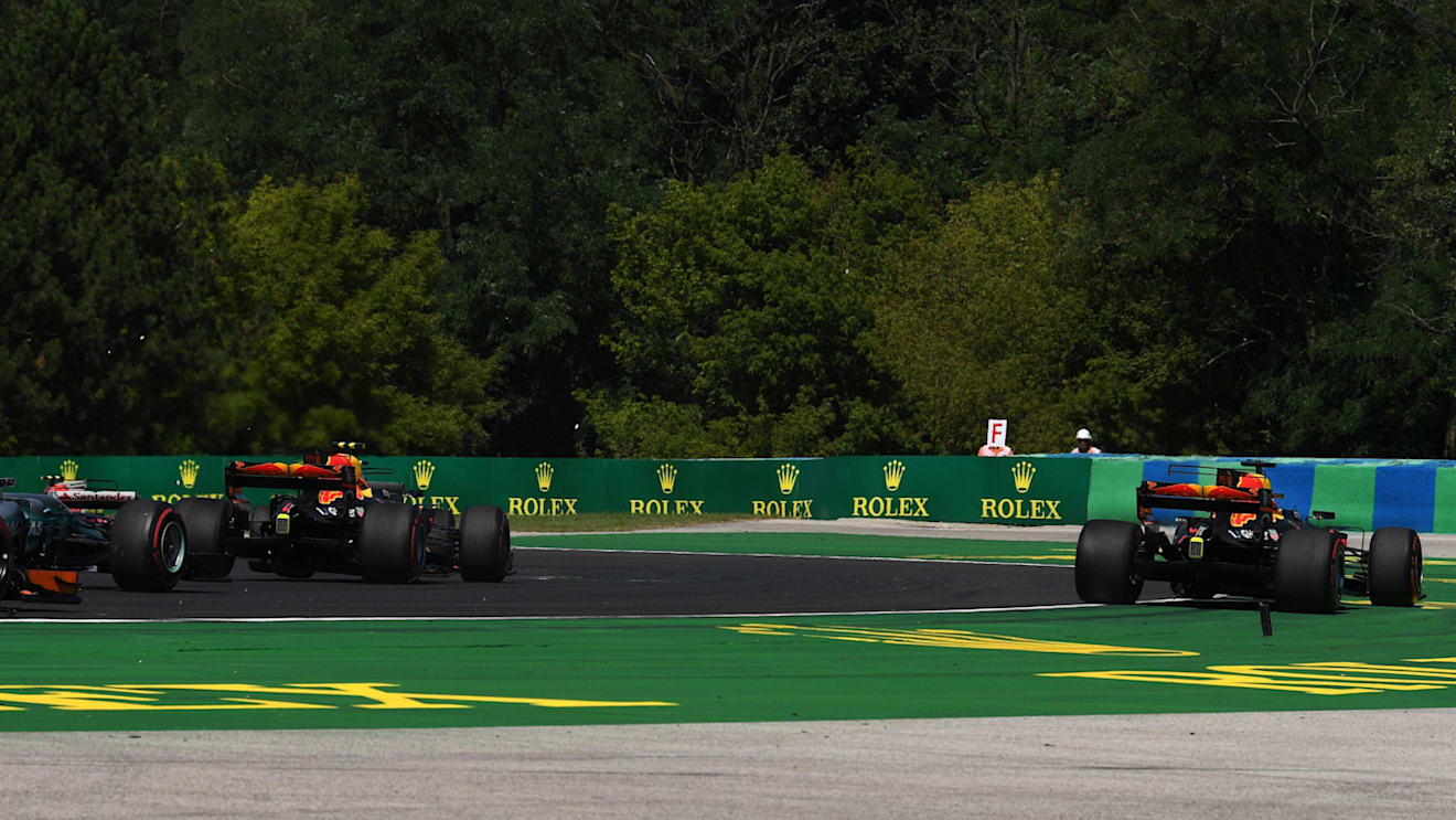 Max Verstappen (NED) Red Bull Racing RB13 and Daniel Ricciardo (AUS) Red Bull Racing RB13 collided at the start of the race at Formula One World Championship, Rd11, Hungarian Grand Prix, Race, Hungaroring, Hungary, Sunday 30 July 2017. © Sutton Images