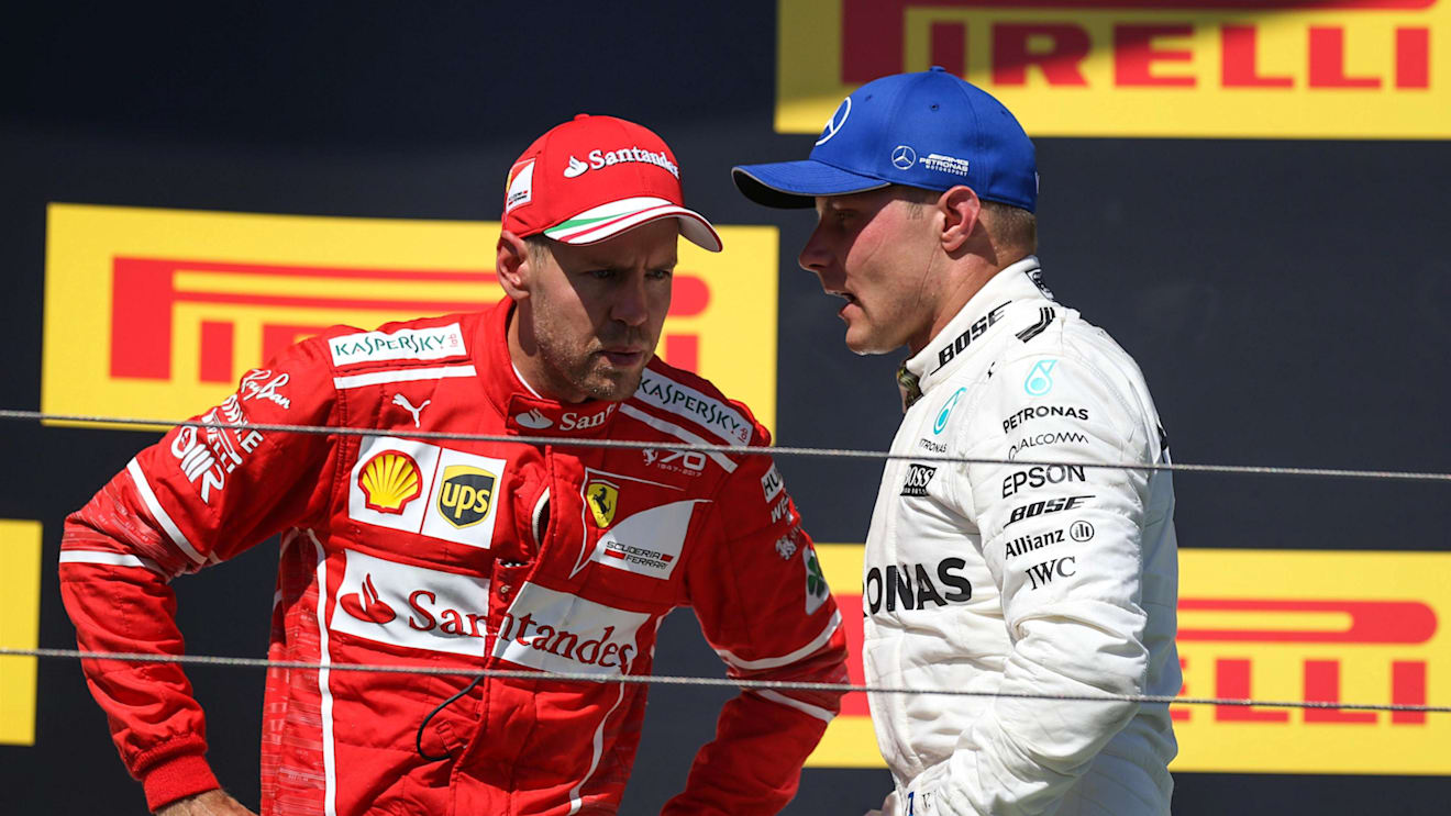 Sebastian Vettel (GER) Ferrari and Valtteri Bottas (FIN) Mercedes AMG F1 on the podium at Formula One World Championship, Rd11, Hungarian Grand Prix, Race, Hungaroring, Hungary, Sunday 30 July 2017. © Sutton Images