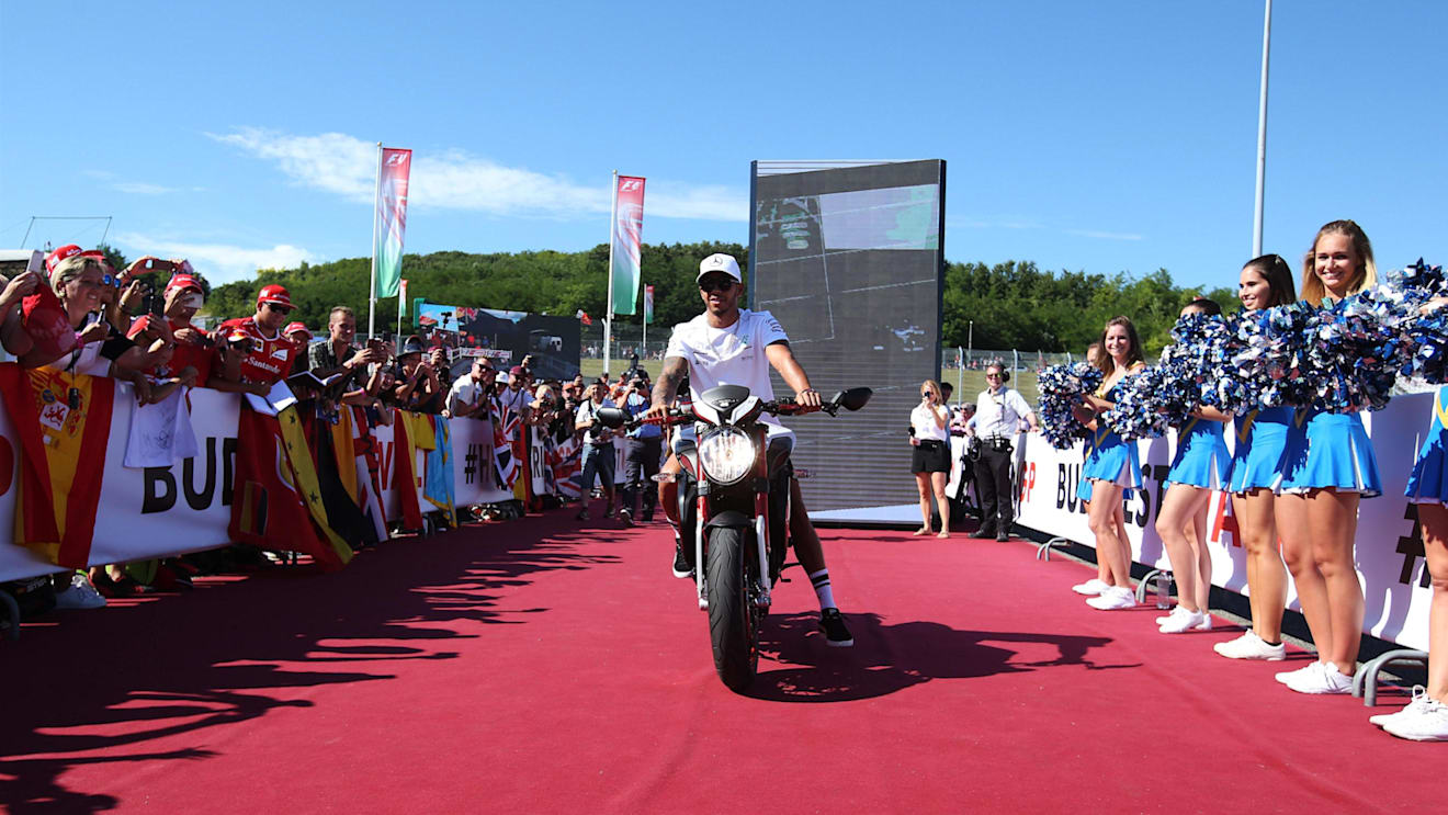 Lewis Hamilton (GBR) Mercedes AMG F1 on his MV Agusta Dragster RR LH44 Limited Edition motorbike at Formula One World Championship, Rd11, Hungarian Grand Prix, Race, Hungaroring, Hungary, Sunday 30 July 2017. © Sutton Images