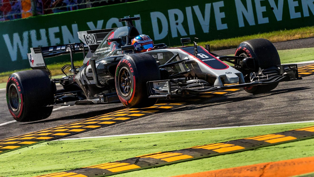Romain Grosjean (FRA) Haas VF-17 runs wide and jumps the kerb at Formula One World Championship, Rd13, Italian Grand Prix, Race, Monza, Italy, Sunday 3 September 2017. © Sutton Images