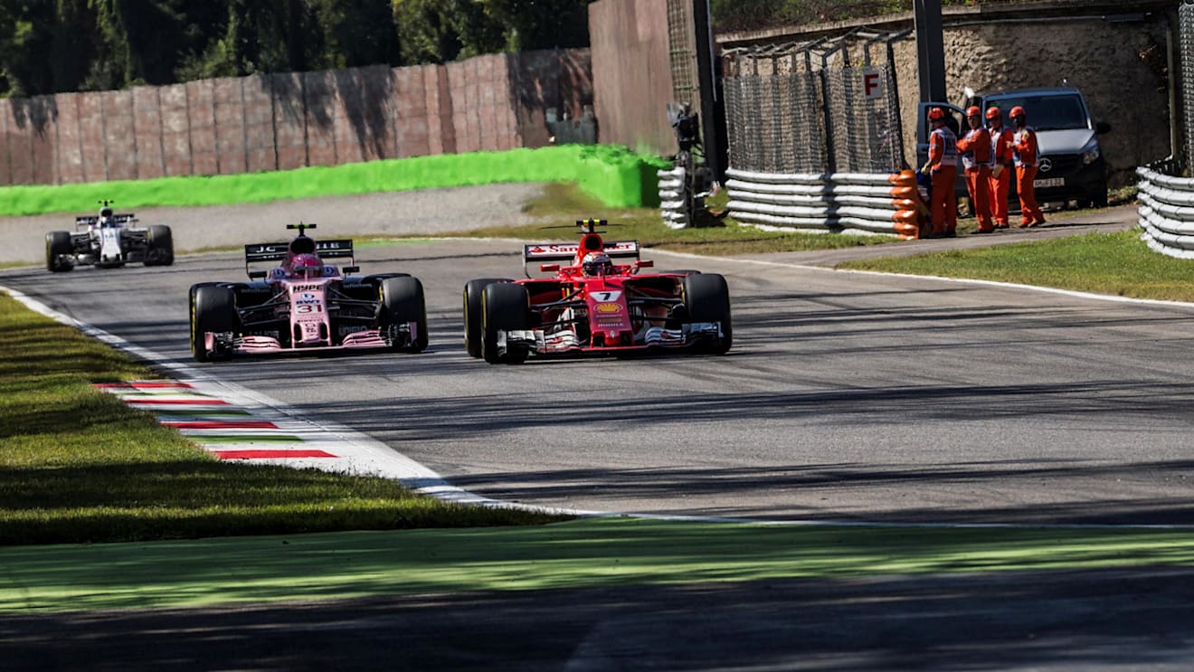 Kimi Raikkonen (FIN) Ferrari SF70-H and Esteban Ocon (FRA) Force India VJM10 battle at Formula One World Championship, Rd13, Italian Grand Prix, Race, Monza, Italy, Sunday 3 September 2017. © Sutton Images