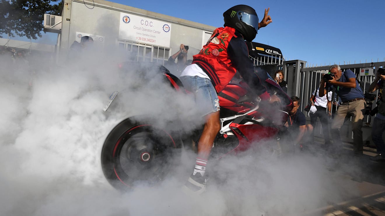 Lewis Hamilton (GBR) Mercedes AMG F1 does a burnout on his motorbike at Formula One World Championship, Rd13, Italian Grand Prix, Qualifying, Monza, Italy, Sunday 3 September 2017. © Sutton Images