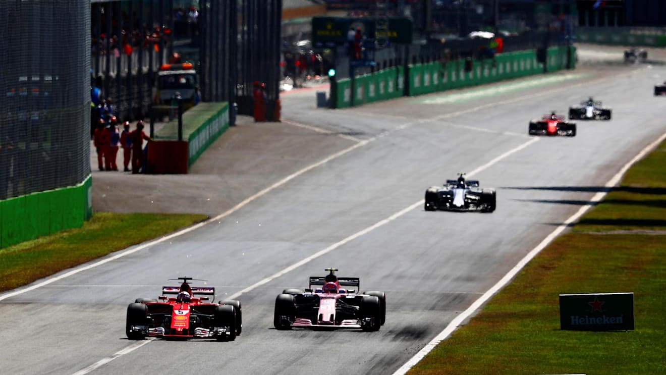 Sebastian Vettel (GER) Ferrari SF70-H and Esteban Ocon (FRA) Force India VJM10 battle at Formula One World Championship, Rd13, Italian Grand Prix, Race, Monza, Italy, Sunday 3 September 2017. © Sutton Images