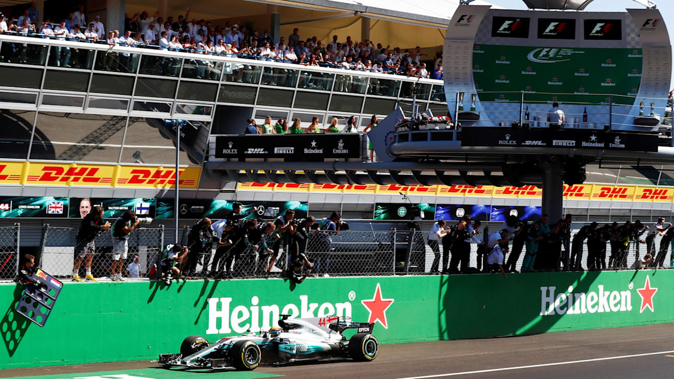 Race winner Lewis Hamilton (GBR) Mercedes-Benz F1 W08 Hybrid takes the chequered flag at Formula One World Championship, Rd13, Italian Grand Prix, Race, Monza, Italy, Sunday 3 September 2017. © Sutton Images