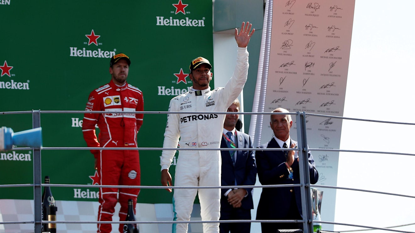 Race winner Lewis Hamilton (GBR) Mercedes AMG F1 and Sebastian Vettel (GER) Ferrari celebrate on the podium at Formula One World Championship, Rd13, Italian Grand Prix, Race, Monza, Italy, Sunday 3 September 2017. © Sutton Images
