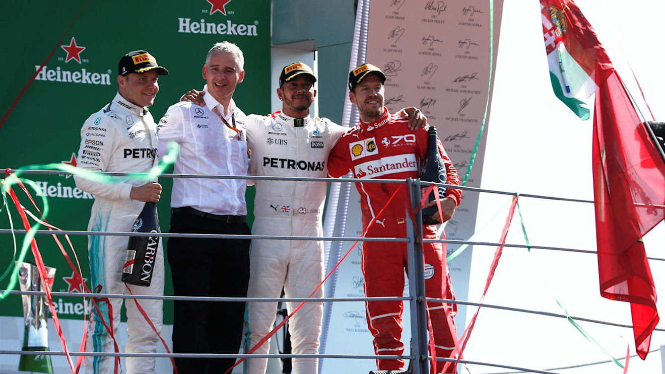 Valtteri Bottas (FIN) Mercedes AMG F1, Lewis Hamilton (GBR) Mercedes AMG F1 and Sebastian Vettel (GER) Ferrari celebrate on the podium at Formula One World Championship, Rd13, Italian Grand Prix, Race, Monza, Italy, Sunday 3 September 2017. © Sutton Images