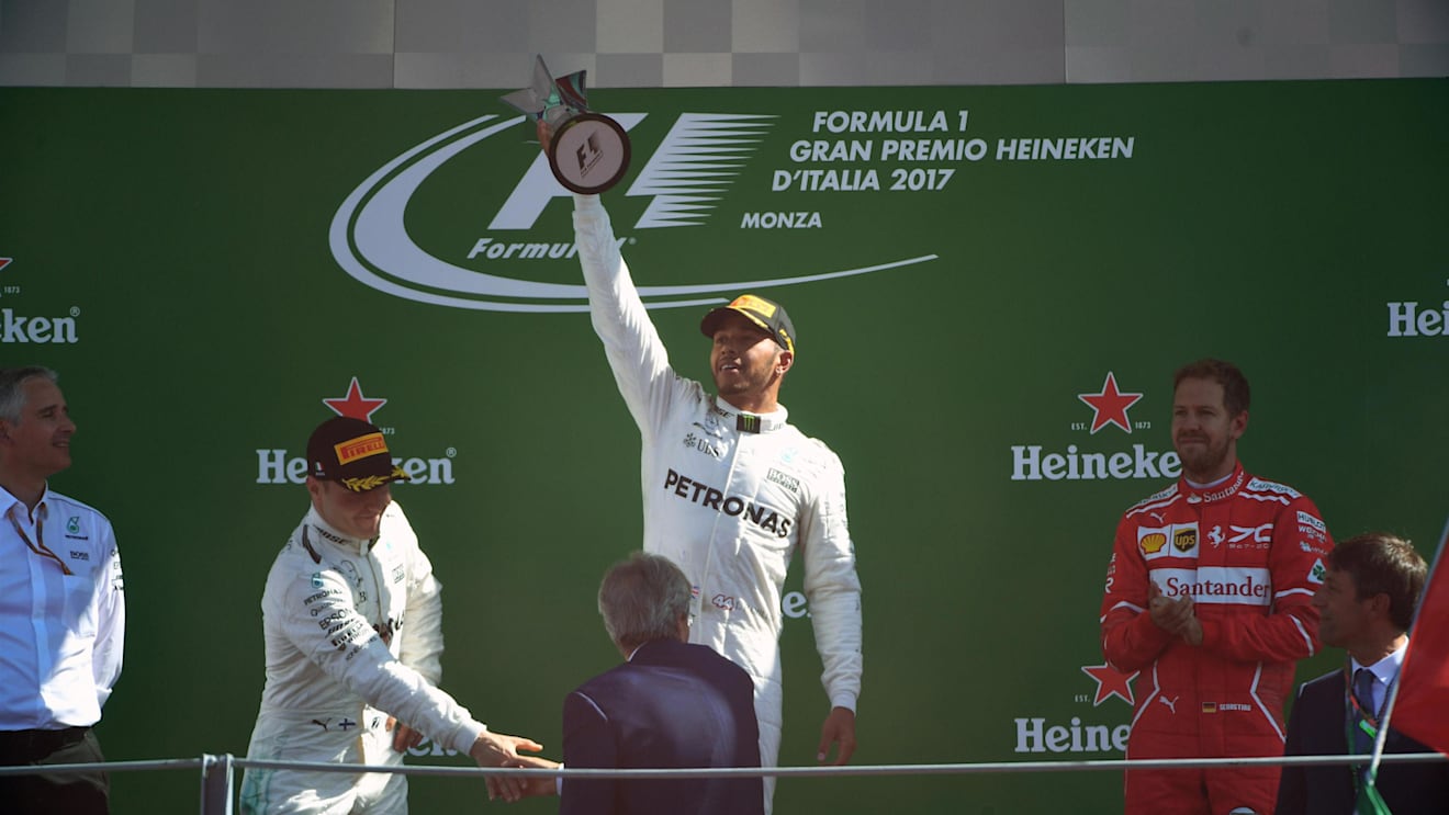 Valtteri Bottas (FIN) Mercedes AMG F1, Lewis Hamilton (GBR) Mercedes AMG F1 and Sebastian Vettel (GER) Ferrari celebrate on the podium at Formula One World Championship, Rd13, Italian Grand Prix, Race, Monza, Italy, Sunday 3 September 2017. © Sutton Images