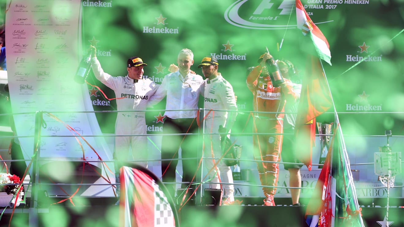 Bottas (FIN) Mercedes AMG F1, Hamilton (GBR) Mercedes AMG F1 and Vettel (GER) Ferrari celebrate on the podium with the champagne at Formula One World Championship, Rd13, Italian Grand Prix, Race, Monza, Italy, Sunday 3 September 2017. © Sutton Images