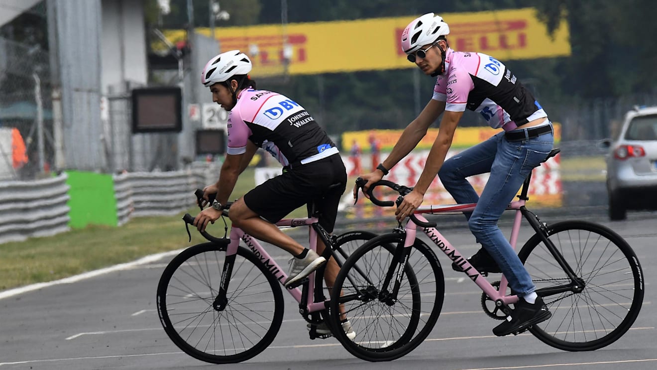Sergio Perez (MEX) Force India and Esteban Ocon (FRA) Force India F1 cycle the track at Formula One World Championship, Rd13, Italian Grand Prix, Preparations, Monza, Italy, Thursday 31 August 2017. © Sutton Images