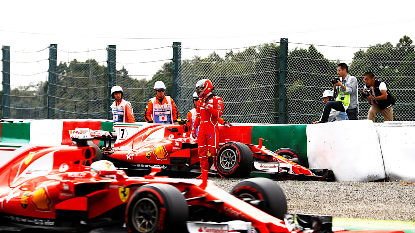Sebastian Vettel (GER) Ferrari SF70-H passes Kimi Raikkonen (FIN) Ferrari who crashed in FP3 at Formula One World Championship, Rd16, Japanese Grand Prix, Qualifying, Suzuka, Japan, Saturday 7 October 2017. © Steven Tee/LAT/Sutton Images