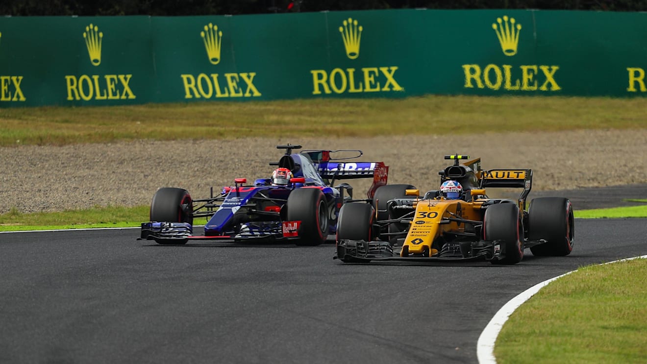 Jolyon Palmer (GBR) Renault Sport F1 Team RS17 and Pierre Gasly (FRA) Scuderia Toro Rosso STR12 at Formula One World Championship, Rd16, Japanese Grand Prix, Qualifying, Suzuka, Japan, Saturday 7 October 2017. © Kym Illman/Sutton Images